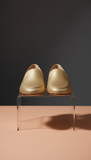 Mocassin minimaliste doré éclat soleil
